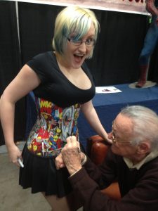 Stan Lee Signs a Marvel Corset
